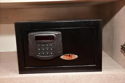 a black pay phone in a wall at Linda Port Hotel in Istanbul