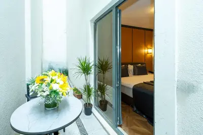 a room with a bed and a table with flowers at Freya Hotel in Istanbul