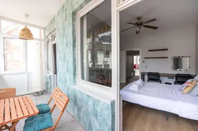 a small room with a bed and a window at 2BR Bright Kadıköy Apartment & AC in Every Room in Istanbul