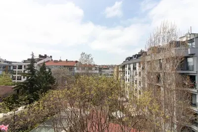 a view of a city with buildings and trees at 2BR Bright Kadıköy Apartment & AC in Every Room in Istanbul
