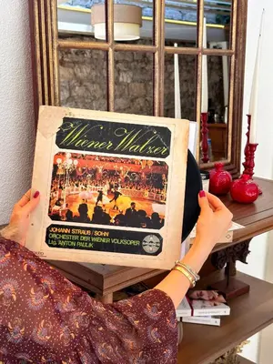 a woman is holding a sign for a concert at Blu Macel Hotel & Suites -Old City Sultanahmet in Istanbul