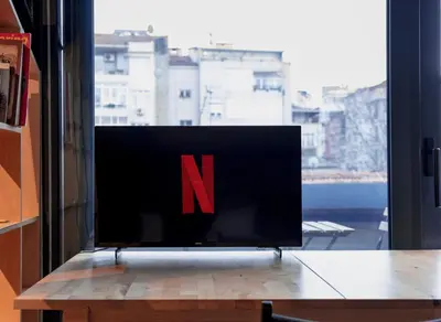 a computer screen with a red letter on it at Homie Suites - ''Loft 27'' Urban Comfort Suites in the Heart of Cihangir in Istanbul