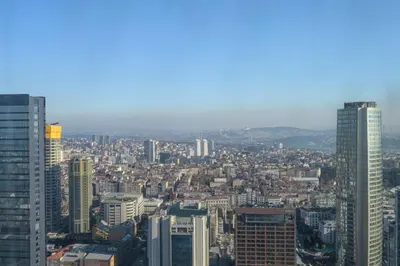 an aerial view of a city with tall buildings at Gorgeous Corner Deluxe 1BD CondoPoolViews! #133 in Istanbul