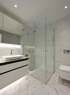 a bathroom with a glass shower and a sink at Cool Airy Modern 2bd2bath Parkingpoolgym! #219 in Istanbul