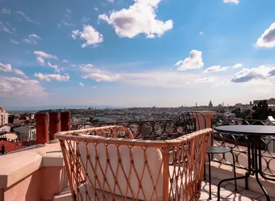 a balcony with a view of a city at Homie Suites - Turna Residences in Cihangir in Istanbul