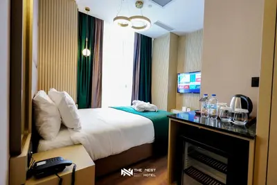 a hotel room with a bed and a fireplace at THE NEST HOTEL in Istanbul