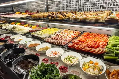 a buffet line with many different types of food at THE NEST HOTEL in Istanbul