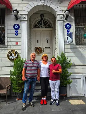 a group of three people standing in front of a building at Solomon's Mansion Hotel Istanbul in Istanbul