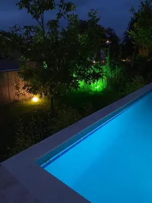 a swimming pool at night with green lights at Nefes Vılla Sapanca in Sakarya