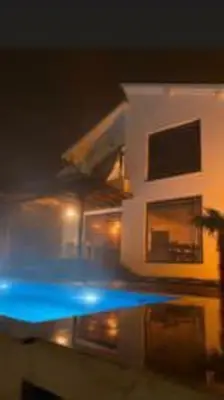 a blurry picture of a building with blue lights at Nefes Vılla Sapanca in Sakarya