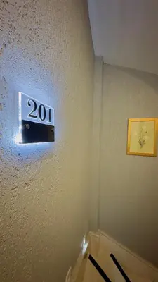 a sign on a wall in a room at La Mer Old City Hotel in Istanbul