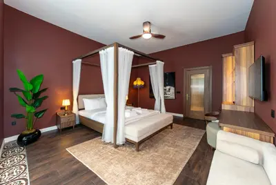 a bedroom with a bed with a canopy at CLK Suites Hotel in Istanbul