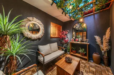 a living room with plants and a couch at CLK Suites Hotel in Istanbul