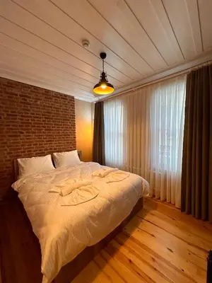 a bedroom with a large bed in a room at Lovely History in Istanbul