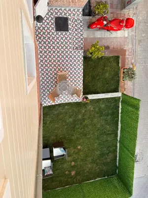 an overhead view of a backyard with a lawn at Lovely History in Istanbul