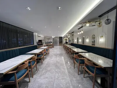 a row of tables and chairs in a restaurant at Boutique Dedem Hotel Sultanahmet in Istanbul