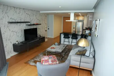 a living room with a couch and a table at Lovely One Plus One BDROOM-836 in Istanbul