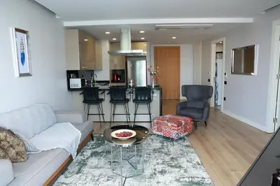 a living room with a couch and a table at Lovely One Plus One BDROOM-836 in Istanbul