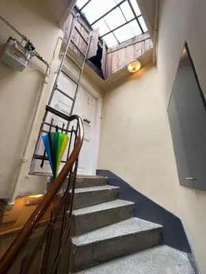 a staircase with a skylight in a building at Güneş House in Istanbul