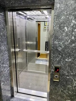 a elevator in a building with a mirror at Doğanın Kalbindeki Eviniz-6 Kişi in Gemlik