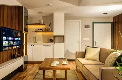a living room with a couch and a table at La Mia Suites in Istanbul