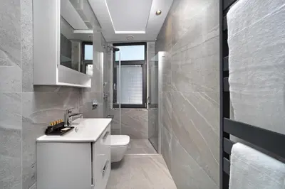 a bathroom with a white toilet and a sink at Union Hotel Plat Inn -Special Category in Istanbul