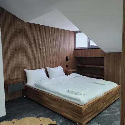 a bedroom with a large bed with a window at Dream house 22 in Istanbul