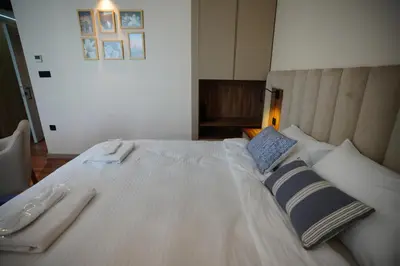 a large white bed with two pillows on it at Dream house 22 in Istanbul
