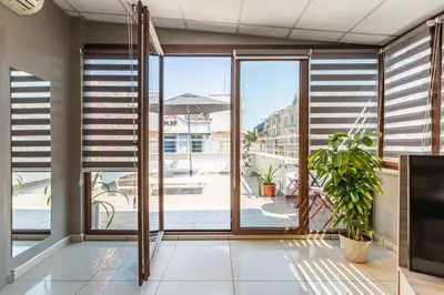 a room with a large window with blinds at Bdino Boutique Hotel in Istanbul