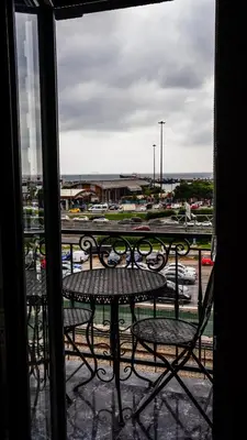 a view of a table and chairs from a window at CK PALACE Hotel in Istanbul