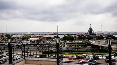 a view of a parking lot with cars in a city at CK PALACE Hotel in Istanbul