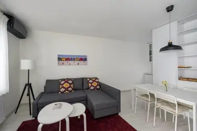 a living room with a couch and a table at Private Modern 2BR1Bath Bebek Gem! #80 in Istanbul