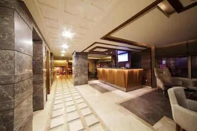 a lobby of a hotel with a bar at Delta Hotel Istanbul & Old City in Istanbul