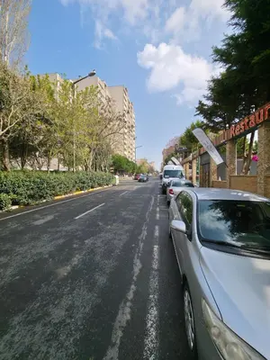 a car parked on the side of a street at Gardan Hotel in Beylikduzu