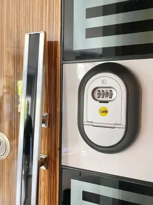 a microwave with a clock on the side of it at K&Y Apartments in Taksim 2 in Istanbul