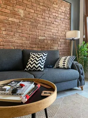 a living room with a couch and a coffee table at K&Y Apartments in Taksim 2 in Istanbul