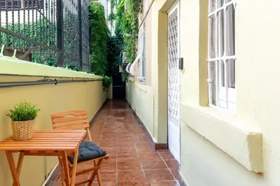 a patio with a table and chairs on a balcony at Atlas Han Hotel in Istanbul