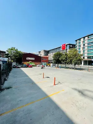 an empty parking lot in a city with tall buildings at Meridiani Taksim Hotel in Istanbul
