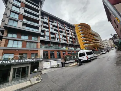 a white van parked in front of a building at Taksim Square Residence, Two bedrooms, pool sauna gym in Istanbul