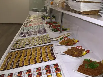 a buffet line with many different types of food at Melidium Hotel in Beylikduzu