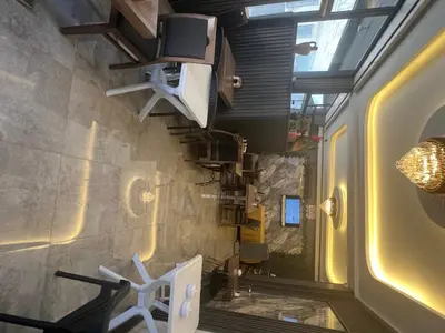 a room with a staircase in a train at Öz Dünya Suites Apartment in Istanbul