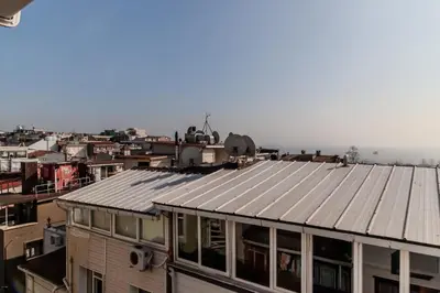 a view of the roofs of buildings in a city at Palladium APART Hotel in Istanbul