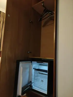 a refrigerator with its door open in a room at Hotel Nayla in Istanbul