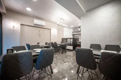 a conference room with tables and chairs in it at Megalos Galata Hotel in Istanbul