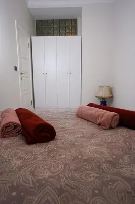 a bedroom with two pillows on a large bed at Merkuri apartments in Istanbul