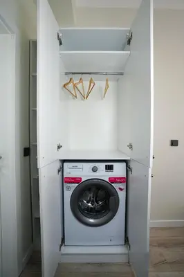 a laundry room with a washer and dryer at Merkuri apartments in Istanbul