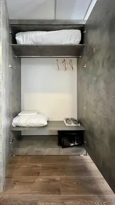 a room with two bunk beds on a wall at GRANDROYAL HOTEL in Gümüşyaka