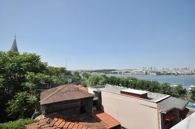 a building with a view of the water at Hotel Baykal in Istanbul