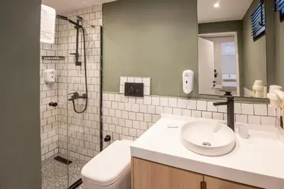 a bathroom with a sink and a shower at BGuest Hotel & Residence in Istanbul