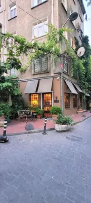 a building with two parking meters in front of it at Stylish City Getaway-Explore the Urban Delights in Istanbul
